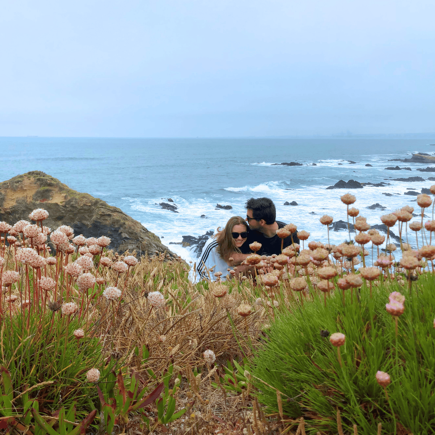 The founders of rooziv calming mushroom and herbs gummies brand at the beach, sharing their journey to creating natural supplements.