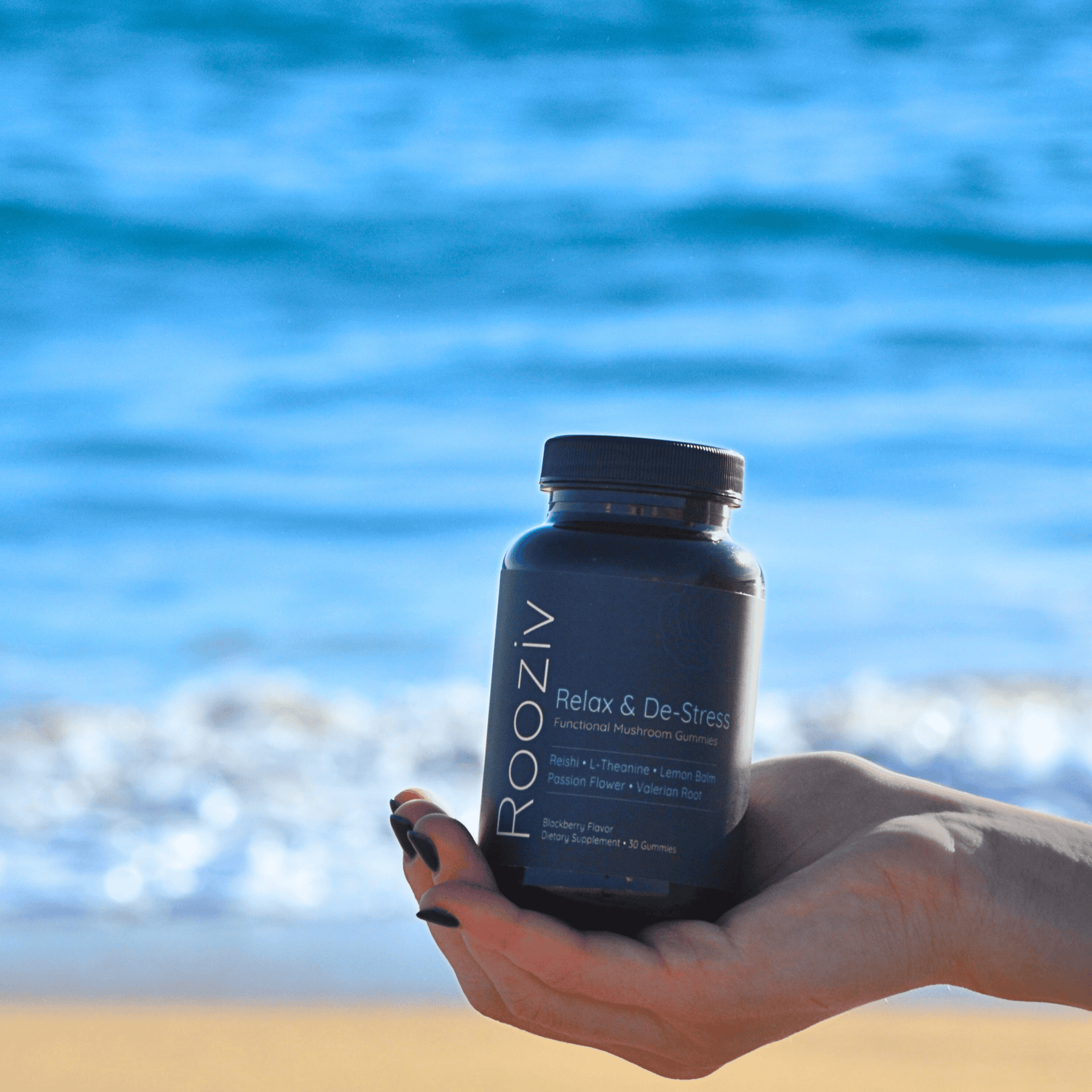 A beachside shot of Rooziv gummies, blending adaptogenic mushrooms and calming herbs to help you relax and sleep better with high-quality natural ingredients.